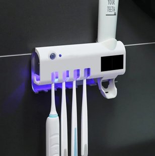 Автоматический диспенсер для зубной пасты и щеток Toothbrush Sterilizer 1439406 фото