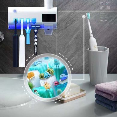 Автоматический диспенсер для зубной пасты и щеток Toothbrush Sterilizer 1439406 фото