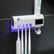 Автоматический диспенсер для зубной пасты и щеток Toothbrush Sterilizer 1439406 фото 1